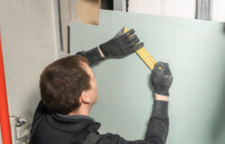 A Man Clearly Demonstrates How to Do Drywall